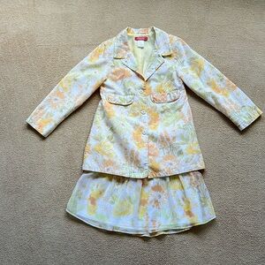 Girl’s floral print skirt and blazer